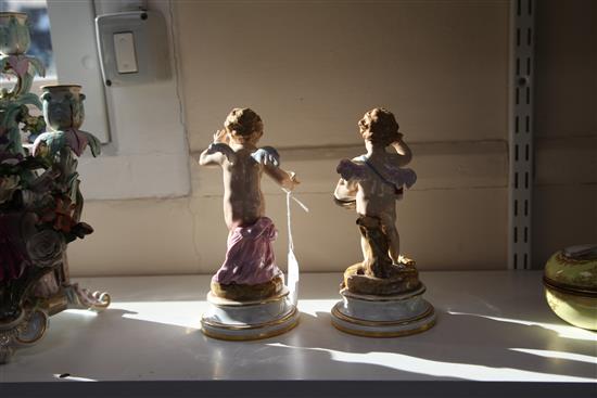 Two Meissen figures of Cupid, circa 1900, 20 cm and 21cm